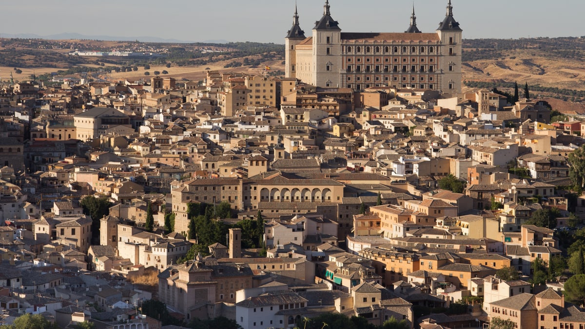 Aerial view of Toledo's historic centre with the Alcázar standing out over the rooftops