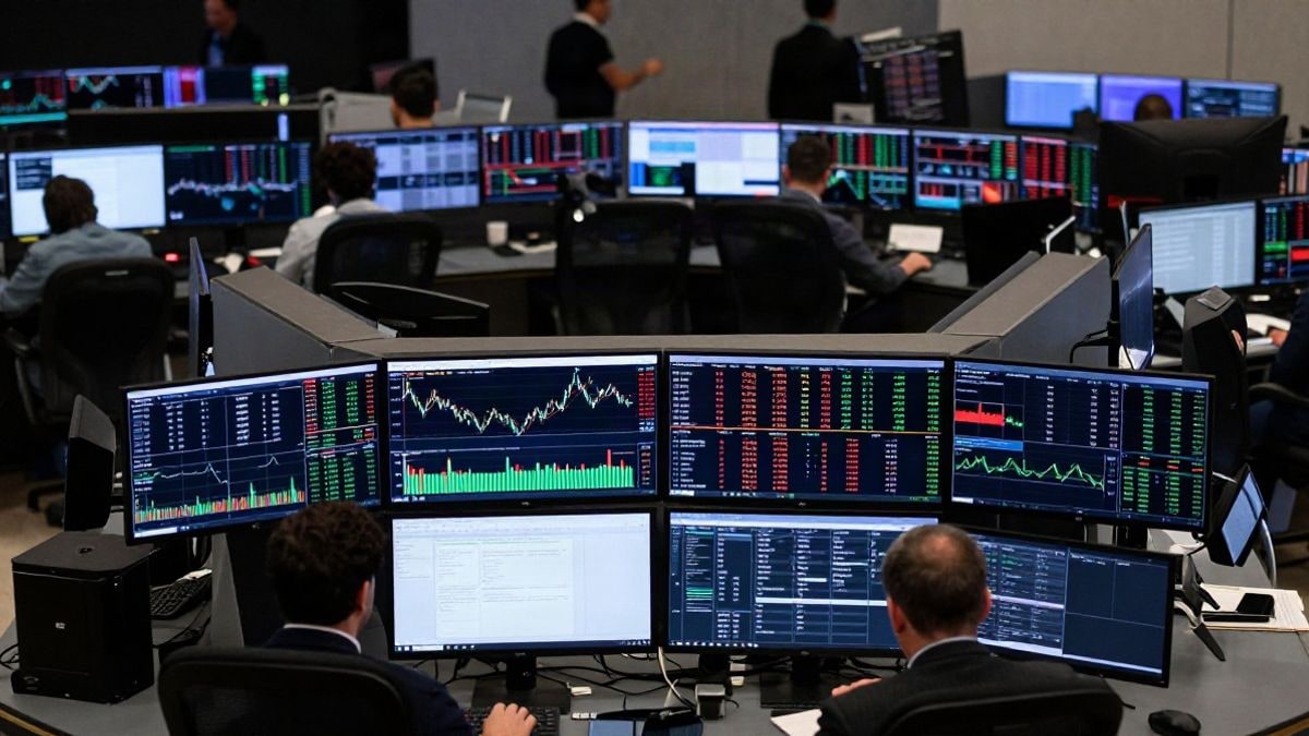 Illustrative image: aerial view of a trading room with quotation screens