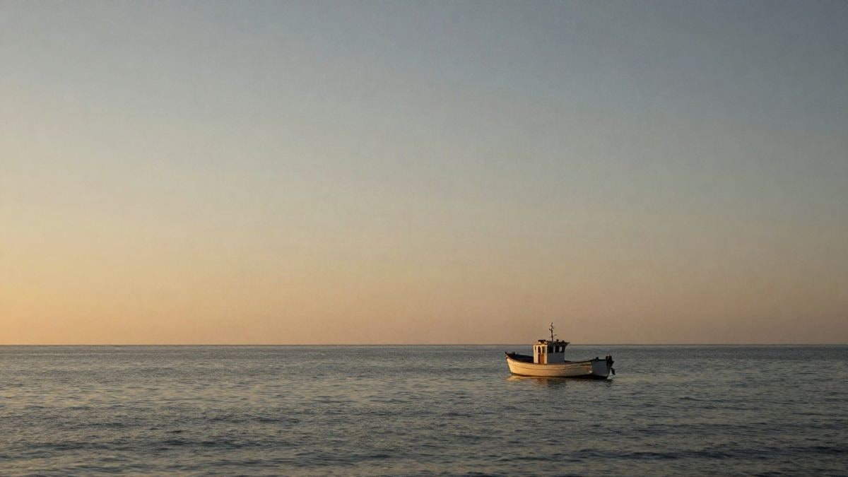 Illustrative image: a small solitary fishing boat on a calm sea at sunset, with plenty of clear sky